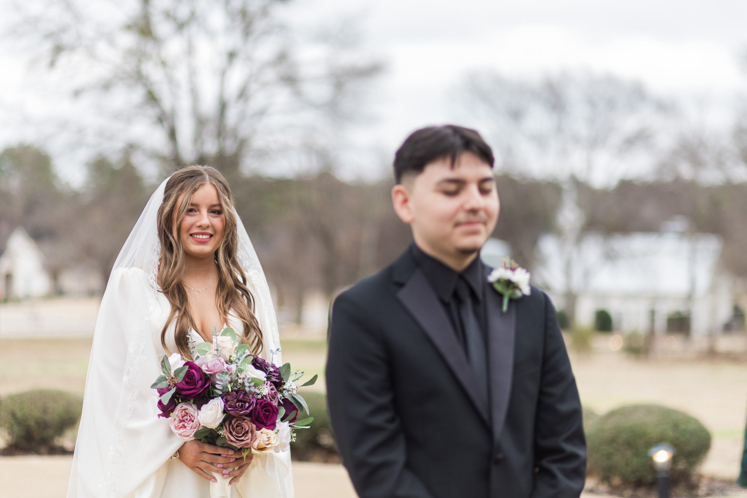 Bride waiting for her groom to turn around and see her for the first time.