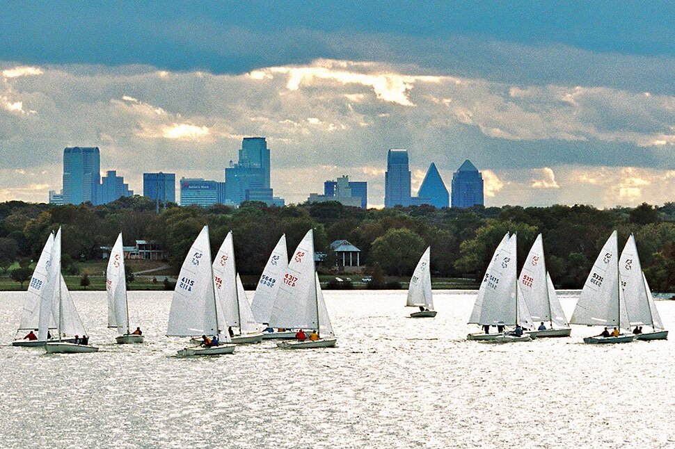 White Rock lake with Dallas skyline in view and sailboats on the water